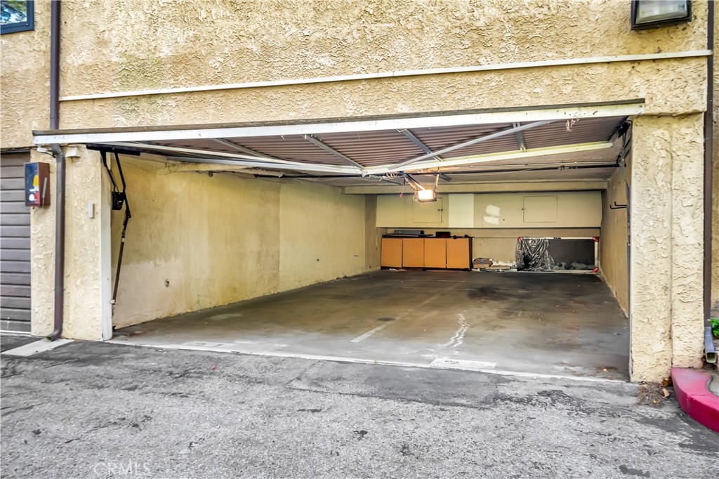 7308 Corbin Avenue, Unit G Reseda, CA 91335 - Photo 24 of 24 Two tandem garage spaces. Left side of this garage.