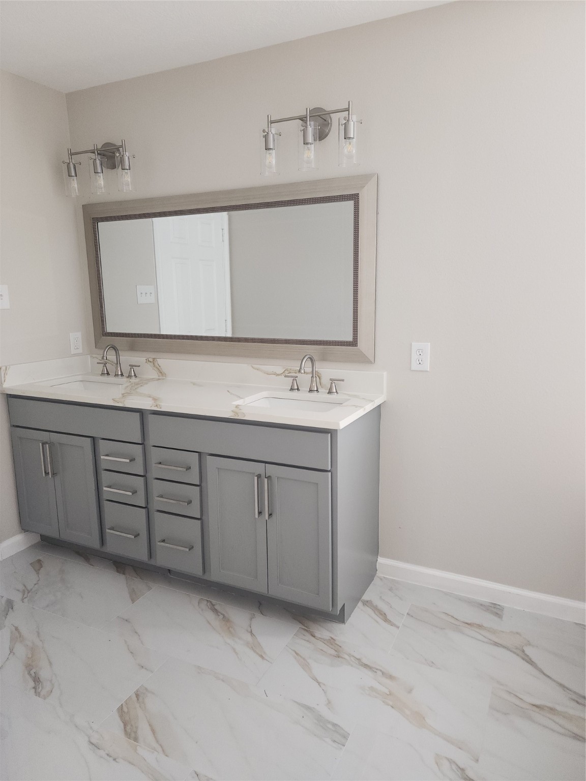10614 Acacia Forest Trail Houston, TX 77089 - Photo 16 of 27 a bathroom with a sink a vanity and a mirror