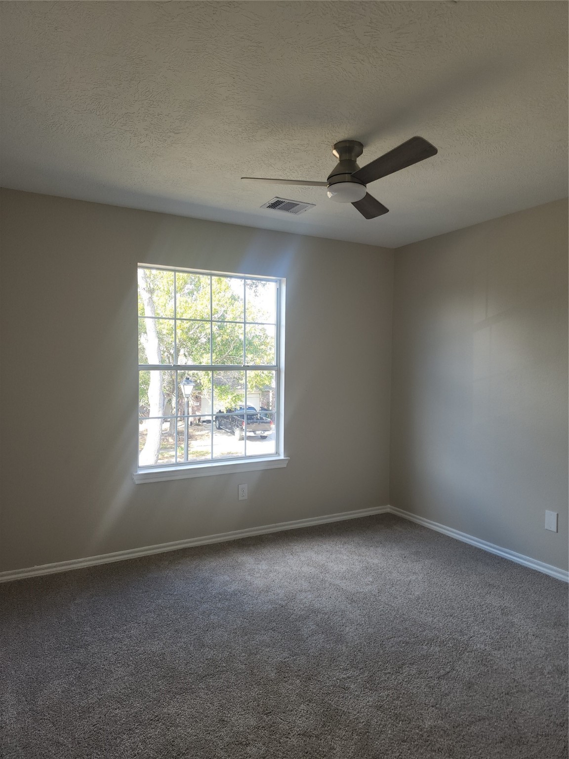 10614 Acacia Forest Trail Houston, TX 77089 - Photo 20 of 27 an empty room with a window