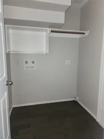 a view of small space with racks on the wall