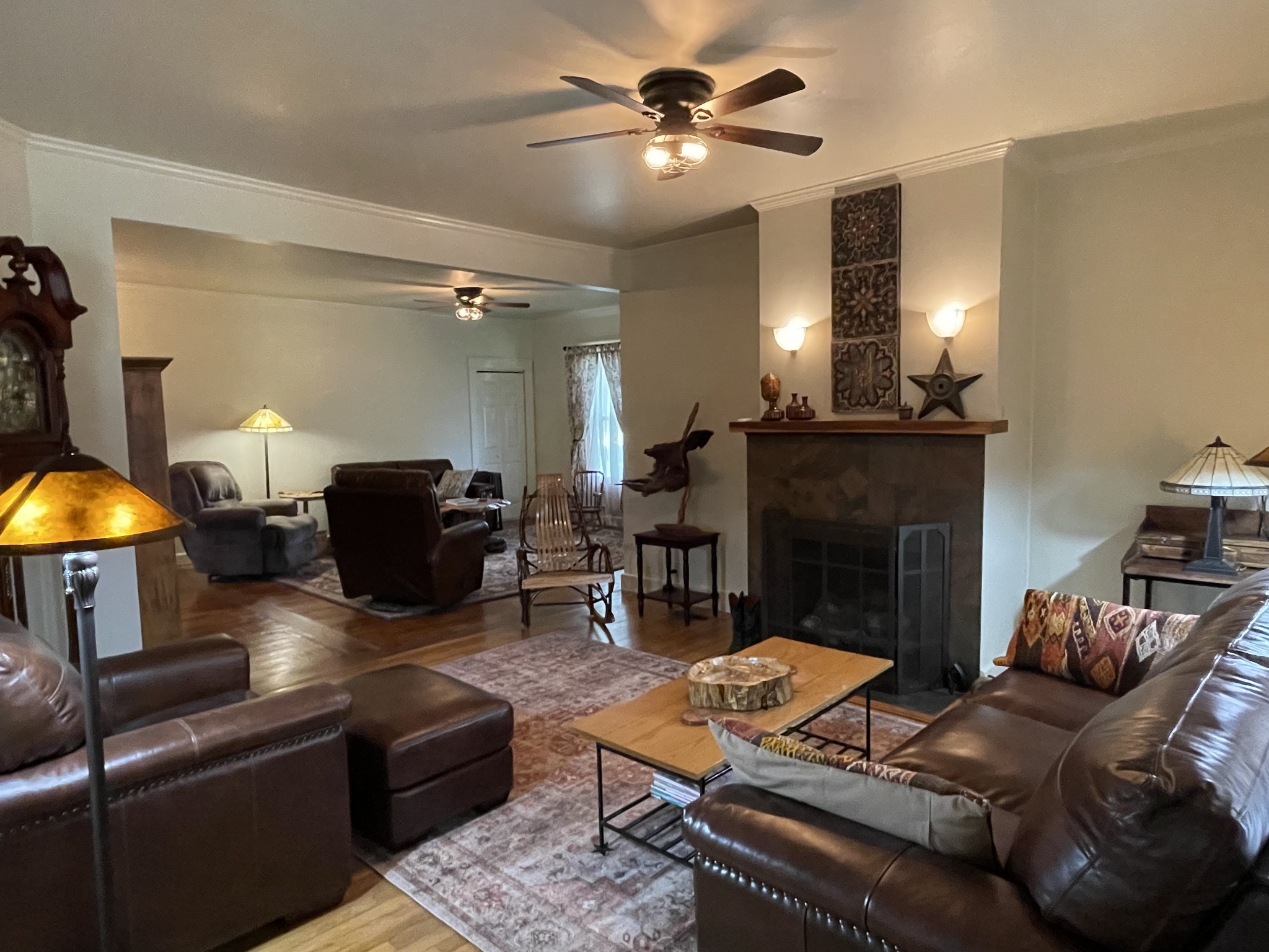 2870 Battle Creek Road Springfield, TN 37172 - Photo 19 of 48 a living room with furniture a fireplace a lamp and a fireplace