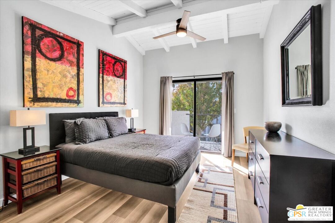 1050 Ramon Road, Unit 116 Palm Springs, CA 92264 - Photo 11 of 34 a bedroom with a bed and a window