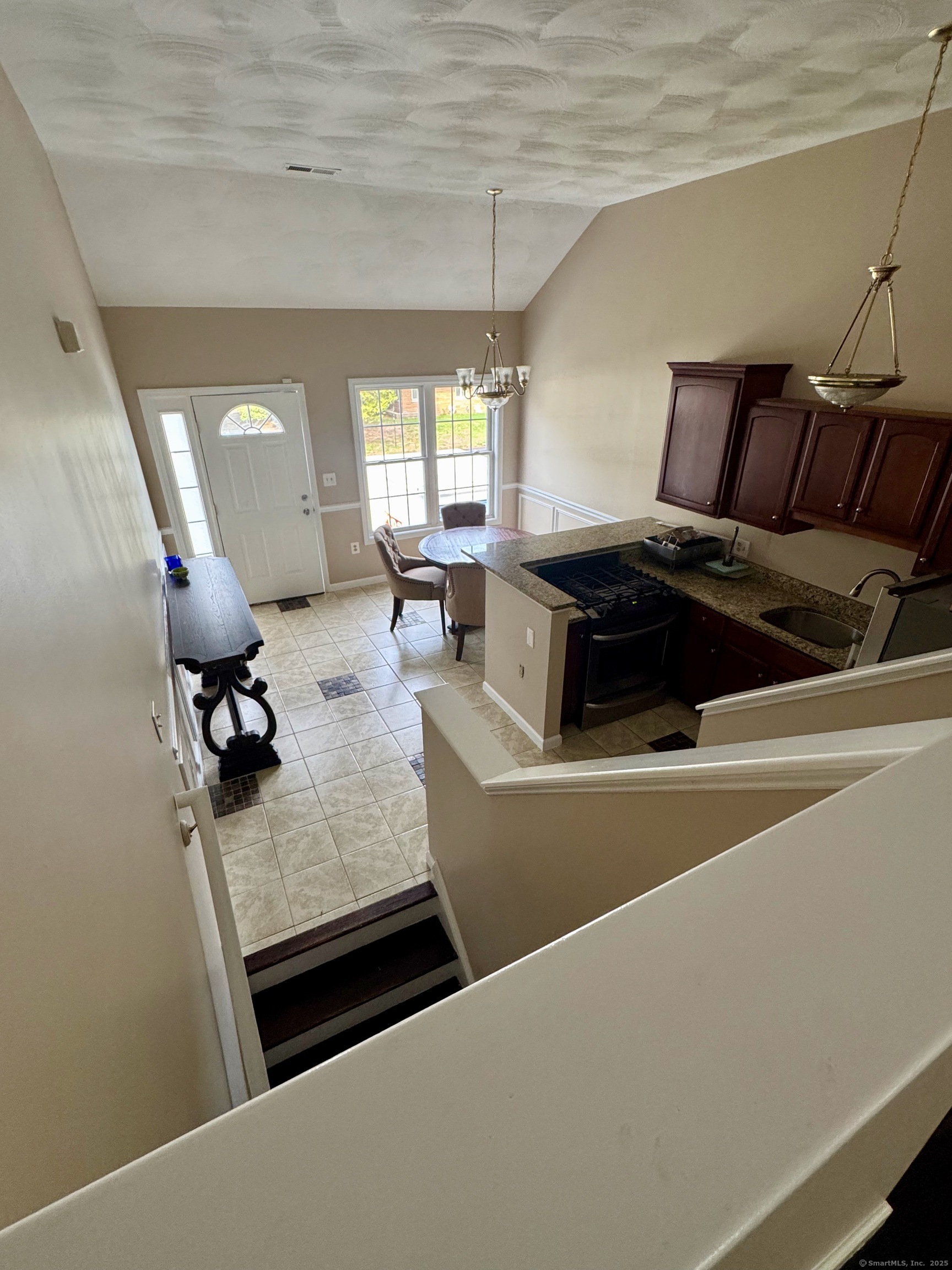 31 Marie Street, Unit B New Haven, CT 06513 - Photo 21 of 36 view from living/family room to Kitchen and dining room.