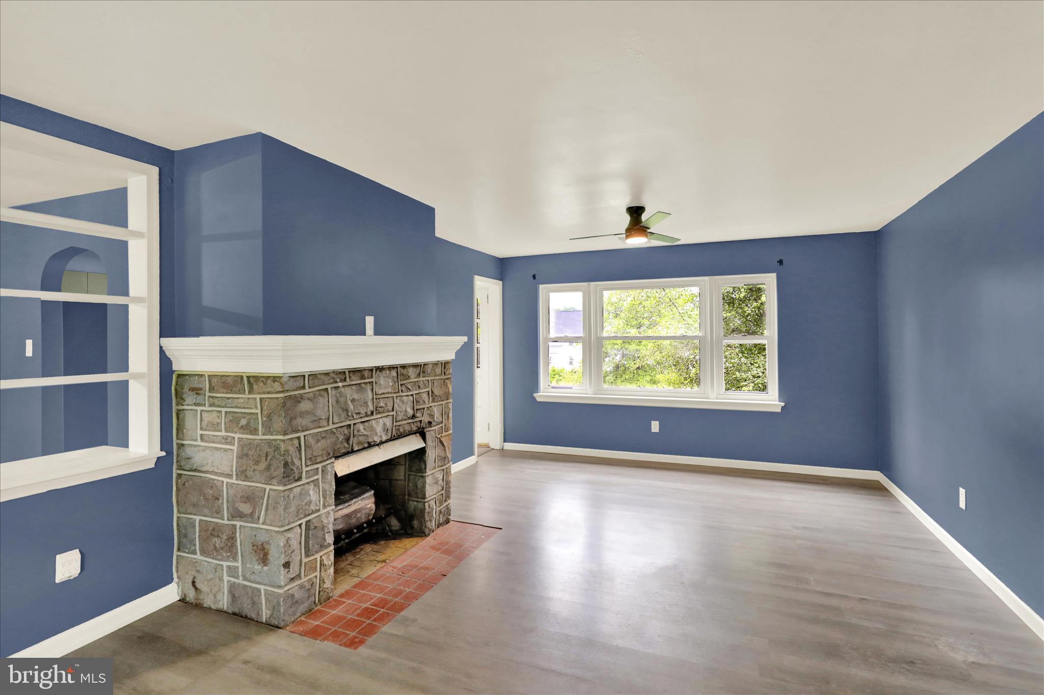 434 East Moyer Road Pottstown, PA 19464 - Photo 7 of 38 a living room with furniture and a fireplace