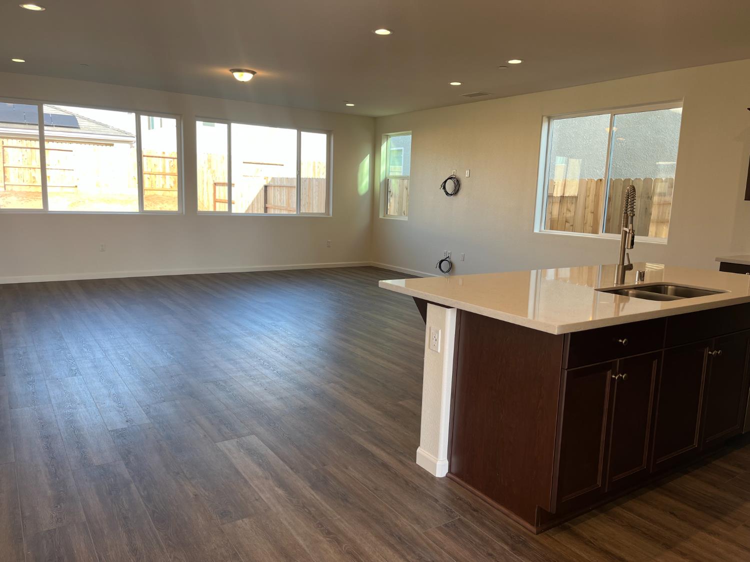 1189 Magnolia Court West Madera, CA 93636 - Photo 3 of 5 a room with wooden floors and windows