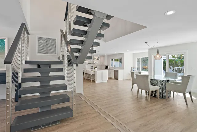 a front view of house with yard and outdoor seating