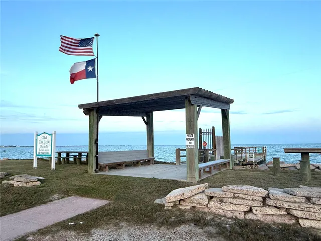 a view of a street with a sitting space
