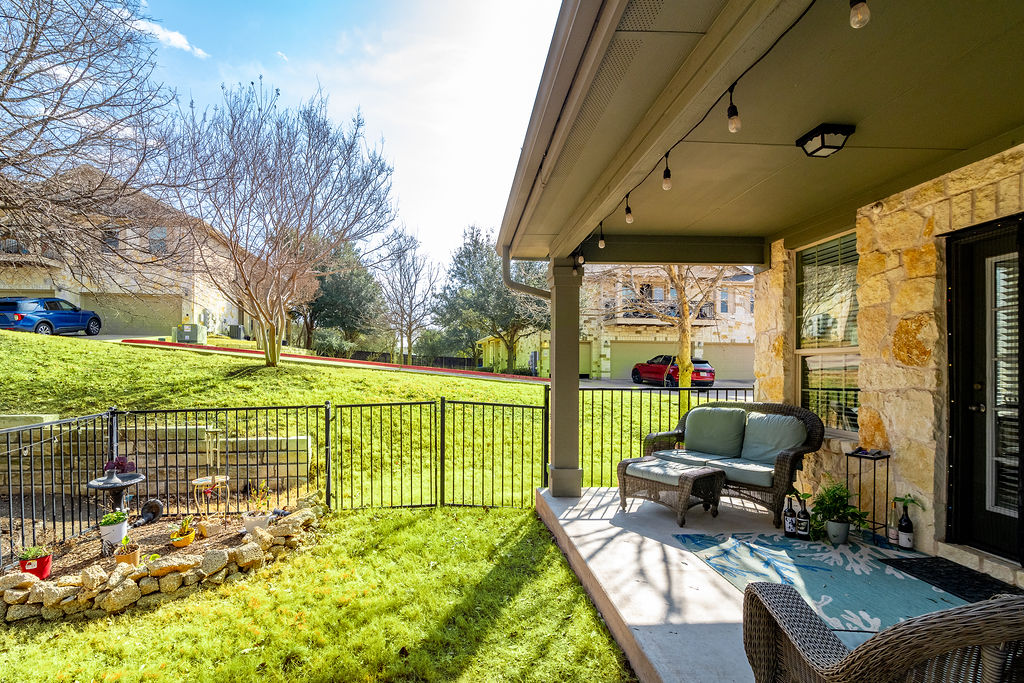 3101 Davis Lane, Unit 8402 Austin, TX 78748 - Photo 20 of 24 a view of backyard with furniture and garden view