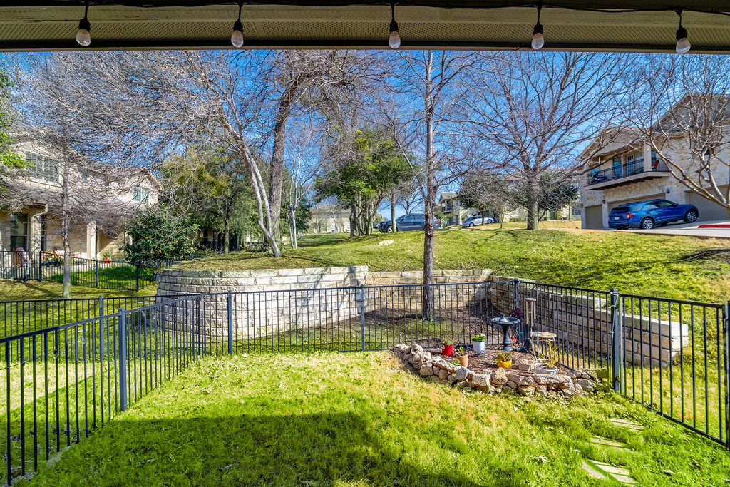 3101 Davis Lane, Unit 8402 Austin, TX 78748 - Photo 21 of 24 a view of a backyard with a garden