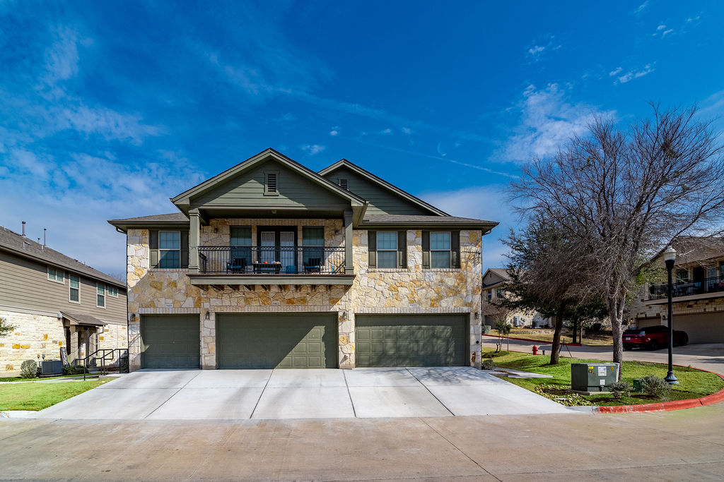 3101 Davis Lane, Unit 8402 Austin, TX 78748 - Photo 3 of 24 a front view of a house with a yard
