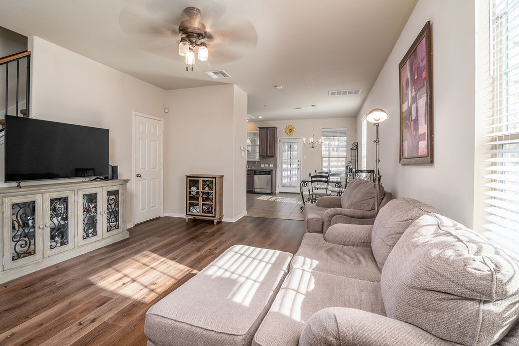 3101 Davis Lane, Unit 8402 Austin, TX 78748 - Photo 5 of 24 a living room with furniture and a flat screen tv