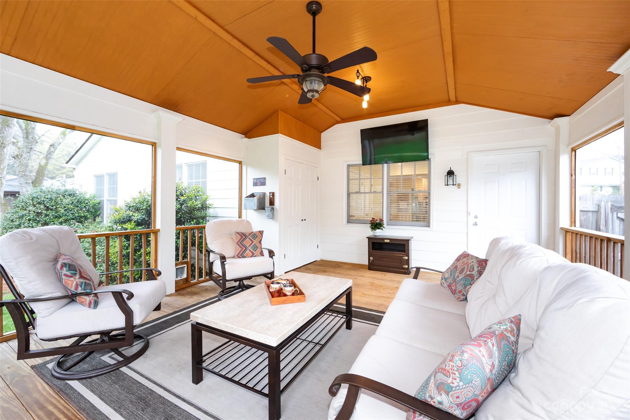 4341 Applegate Road Charlotte, NC 28209 - Photo 21 of 39 a living room with furniture a table and a large window