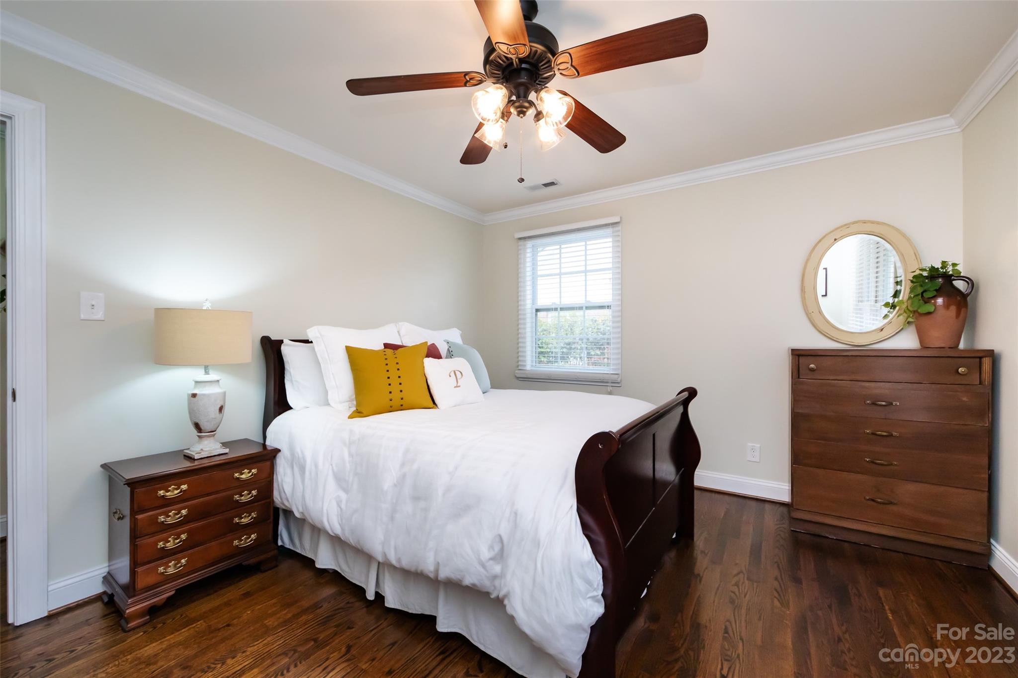 4341 Applegate Road Charlotte, NC 28209 - Photo 27 of 39 a bedroom with a bed and a dresser