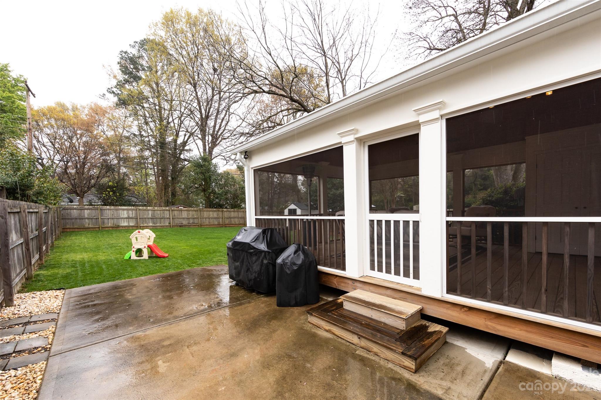 4341 Applegate Road Charlotte, NC 28209 - Photo 33 of 39 a view of backyard with green space and porch