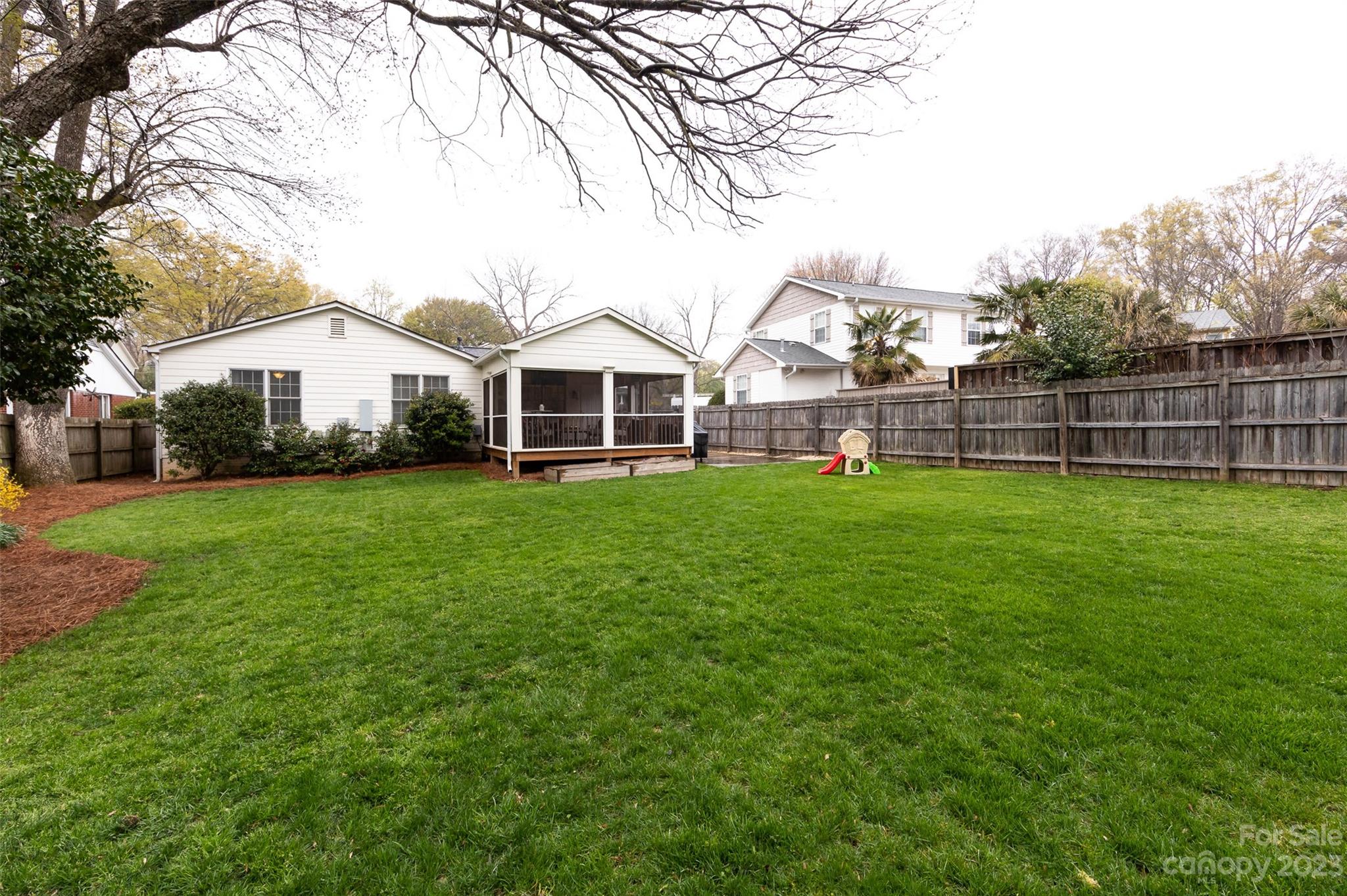 4341 Applegate Road Charlotte, NC 28209 - Photo 38 of 39 a view of a house with a big yard and large trees