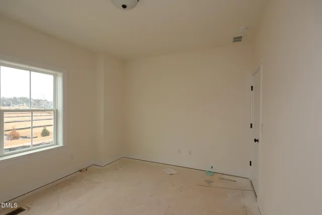 an empty room with a window