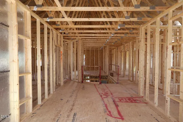 wooden floor with a glass door