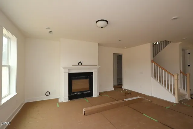 a room with window and wooden floor