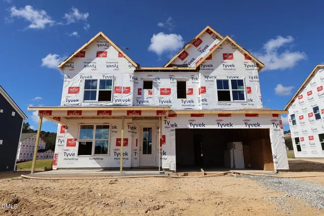 a front view of a building with glass windows