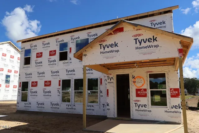 a view of entryway with wooden walls