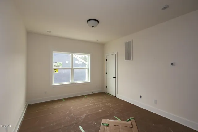 an empty room with a window