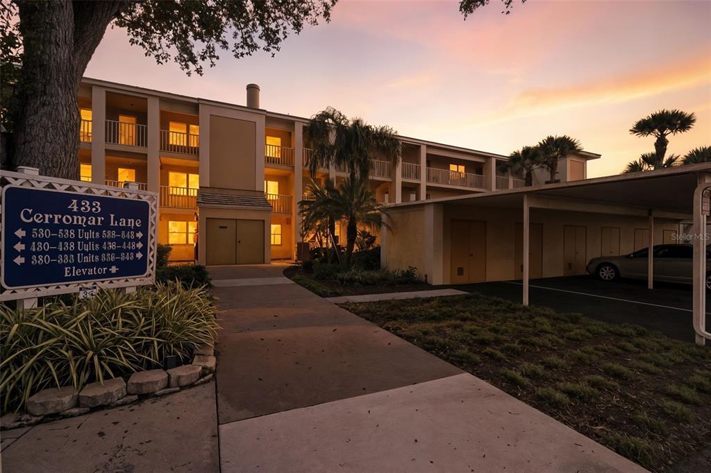 433 Cerromar Lane, Unit 441 Venice, FL 34293 - Photo 60 of 65 a view of a house with a patio