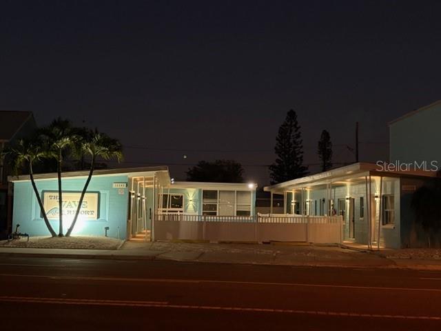 13343 Gulf Boulevard, Unit A1 St. Petersburg, FL 33708 - Photo 8 of 8 a view of a house with a swimming pool