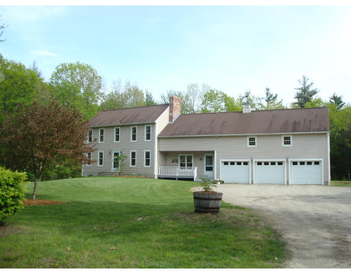 a house view with a garden space