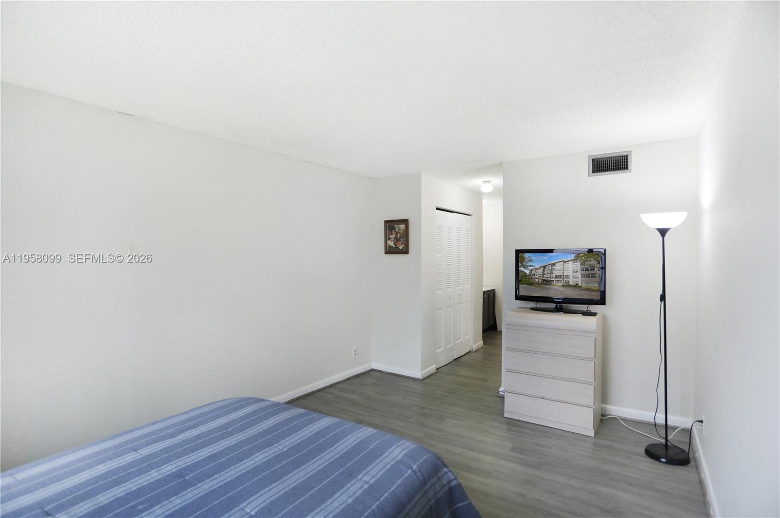 6600 Cypress Road, Unit 105 Plantation, FL 33317 - Photo 15 of 51 a view of a kitchen with wooden floor and a sink