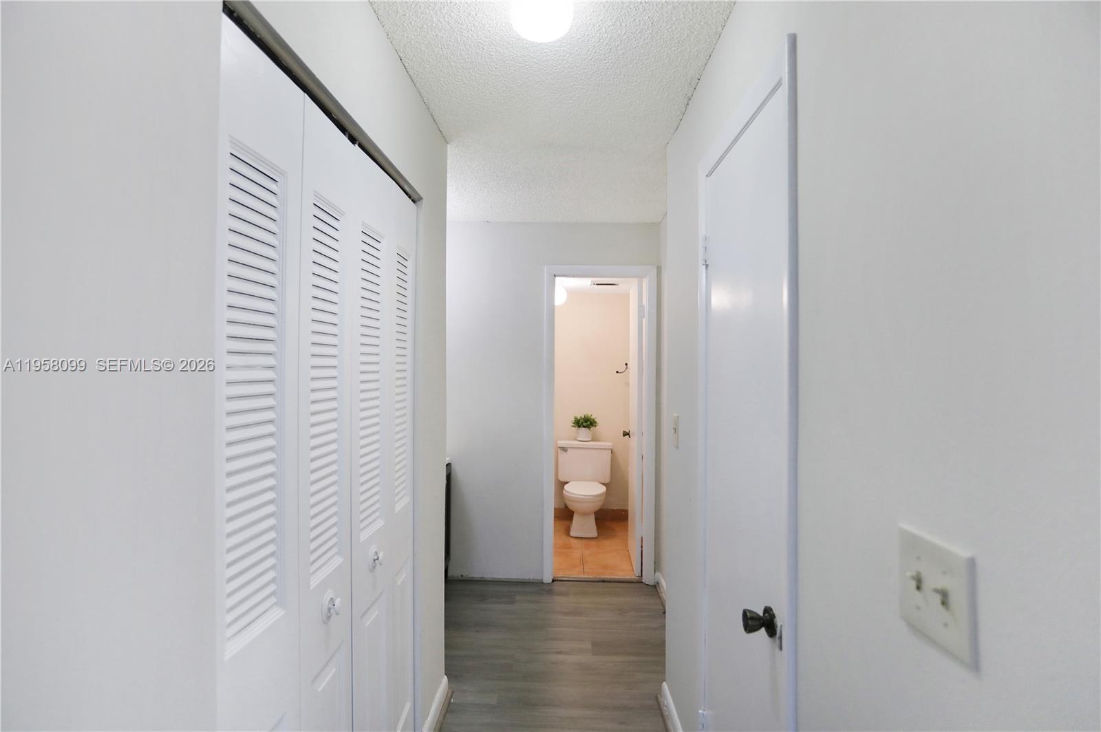 6600 Cypress Road, Unit 105 Plantation, FL 33317 - Photo 22 of 51 a view of a bathroom from the hallway