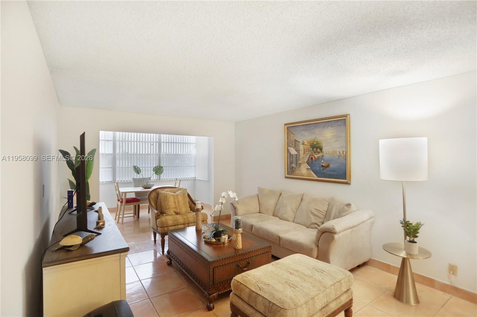 6600 Cypress Road, Unit 105 Plantation, FL 33317 - Photo 24 of 51 a living room with furniture and a window