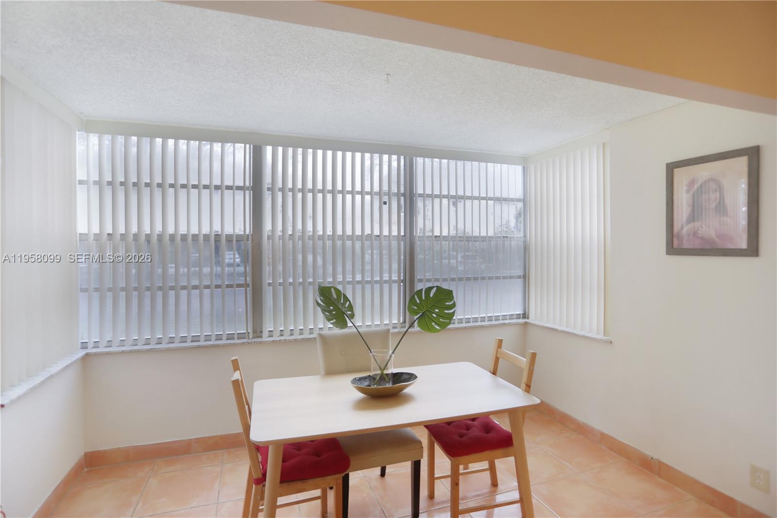 6600 Cypress Road, Unit 105 Plantation, FL 33317 - Photo 26 of 51 a dining room with furniture and window
