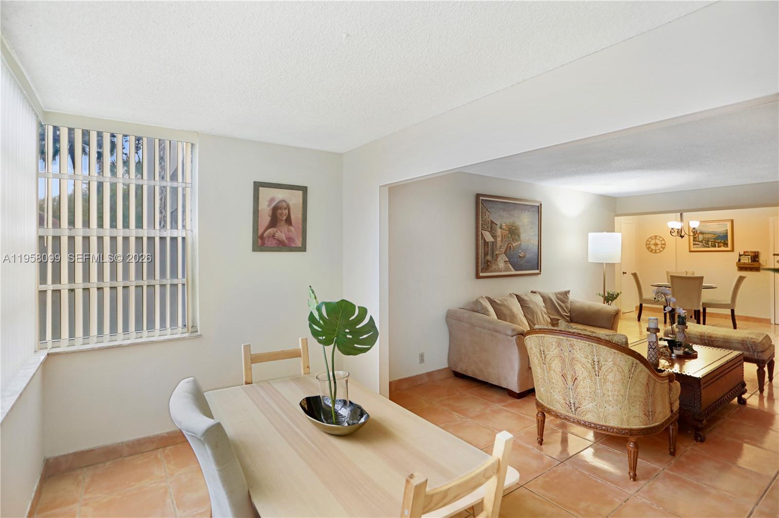 6600 Cypress Road, Unit 105 Plantation, FL 33317 - Photo 27 of 51 a living room with furniture and wooden floor