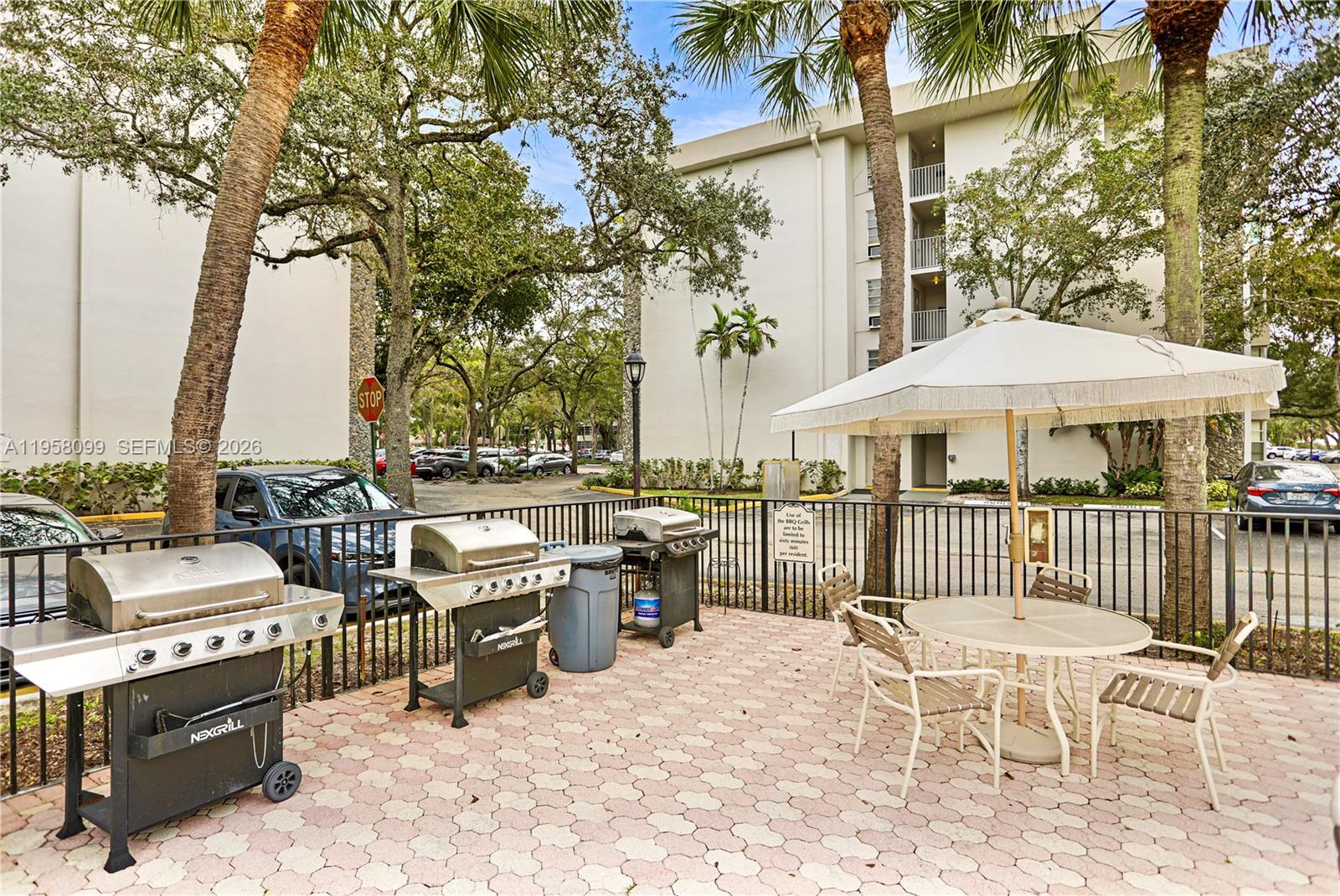 6600 Cypress Road, Unit 105 Plantation, FL 33317 - Photo 8 of 51 a view of a chairs and table in the patio
