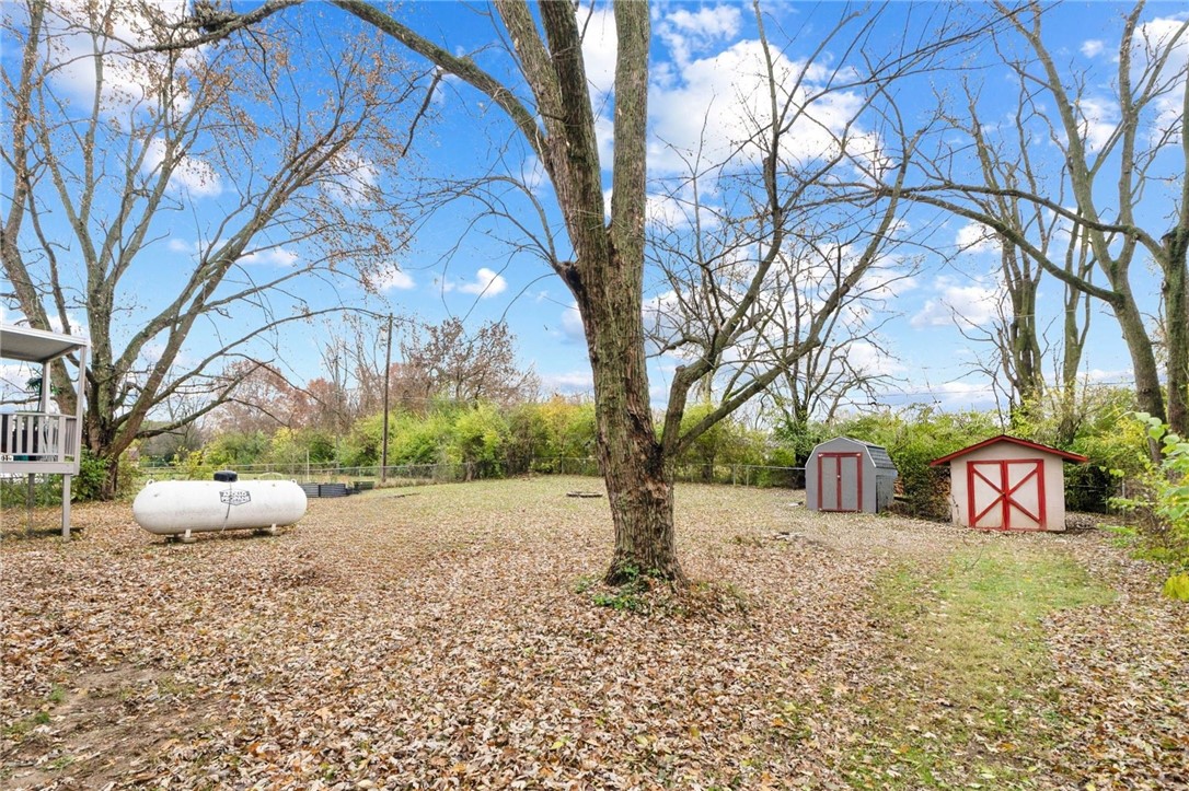 8180 Manning Road Germantown, OH 45327 - Photo 35 of 39 This spacious yard offers ample outdoor potential, featuring two storage sheds for convenience.