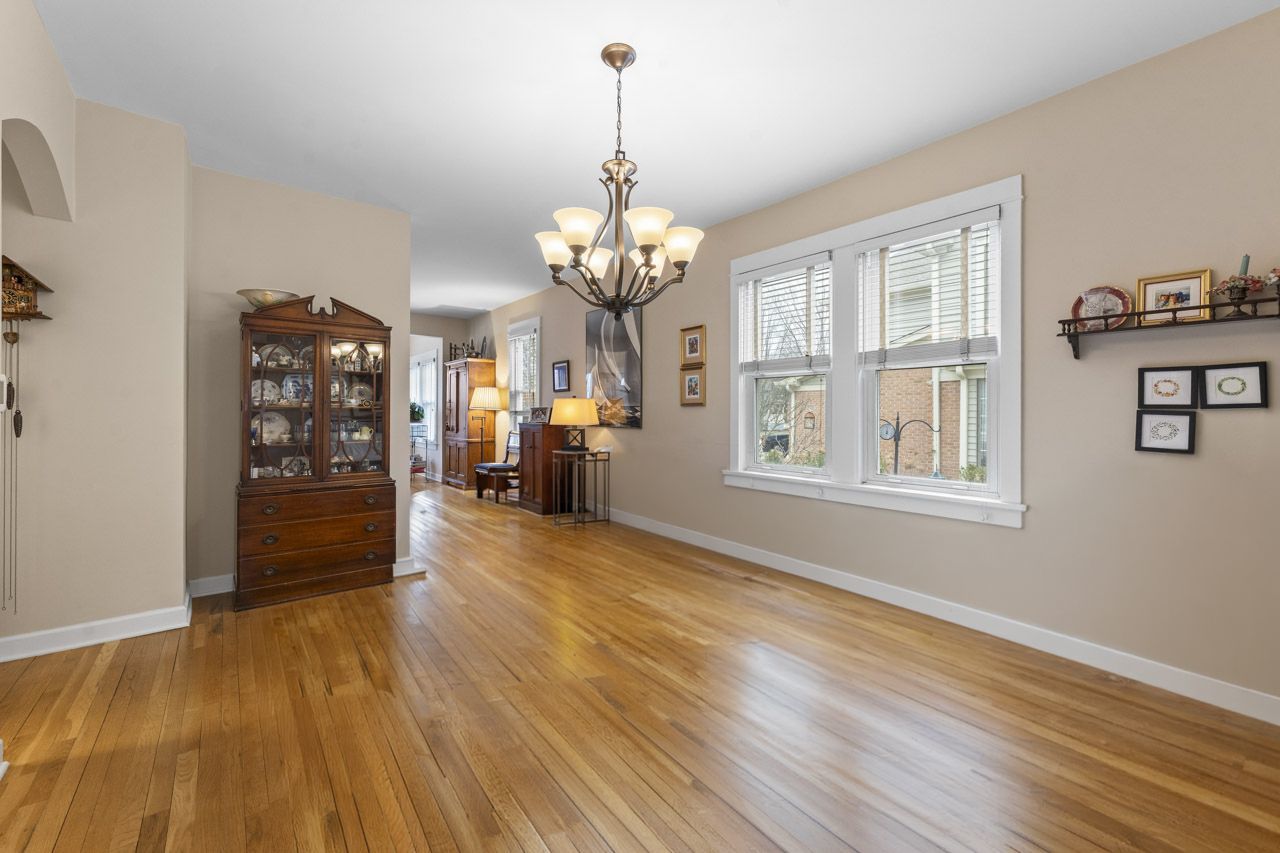 114 South Elm Street Mount Prospect, IL 60056 - Photo 11 of 44 wooden floor in an empty room with a window
