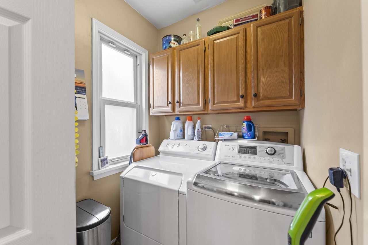 114 South Elm Street Mount Prospect, IL 60056 - Photo 19 of 44 a utility room with dryer and washer