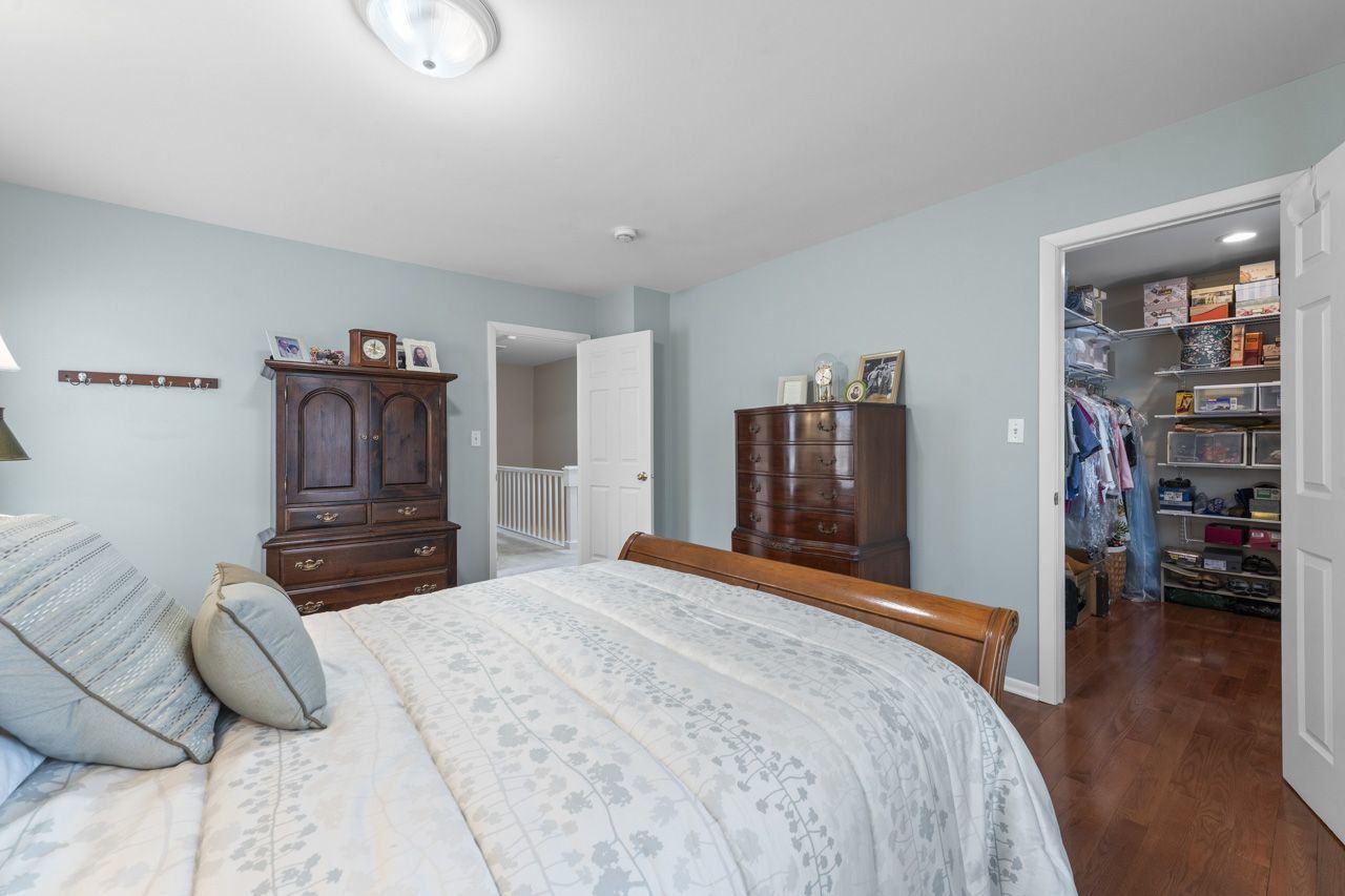 114 South Elm Street Mount Prospect, IL 60056 - Photo 23 of 44 a bedroom with a large bed and a closet