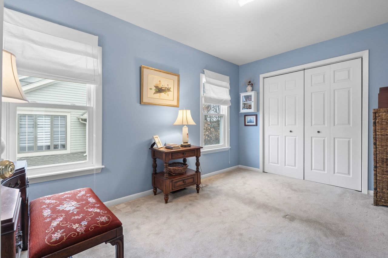 114 South Elm Street Mount Prospect, IL 60056 - Photo 24 of 44 a bedroom with furniture and a window