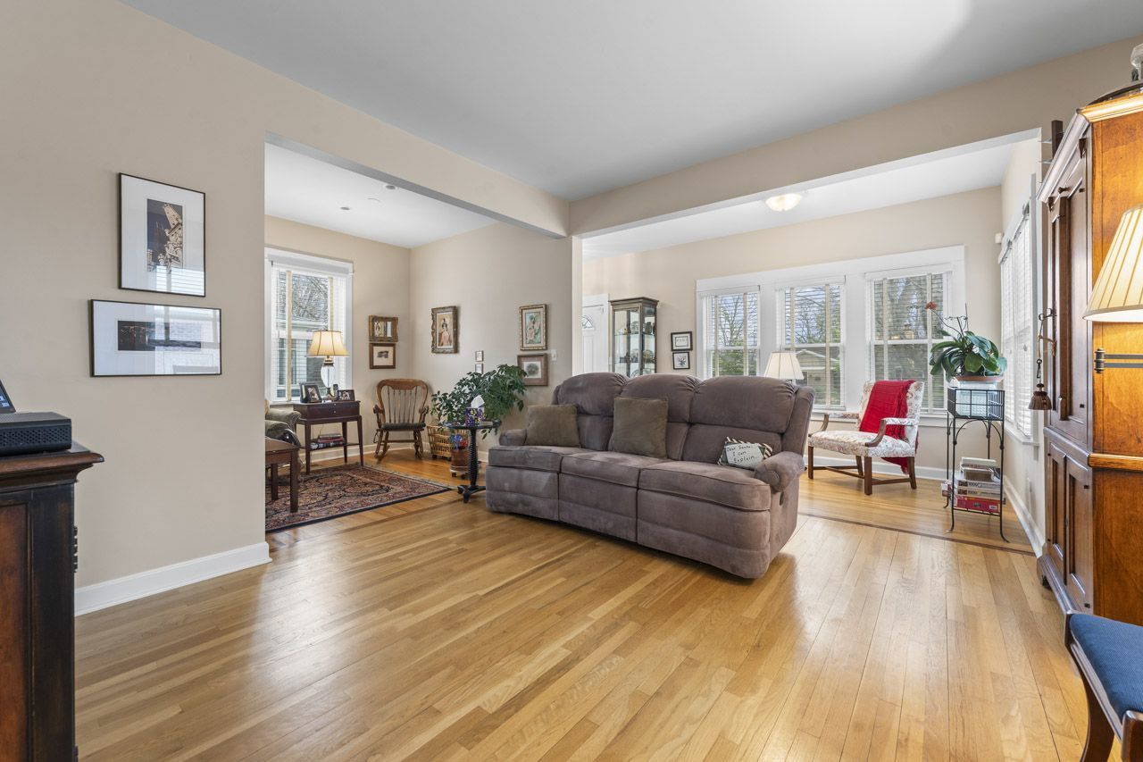114 South Elm Street Mount Prospect, IL 60056 - Photo 6 of 44 a living room with furniture and a wooden floor