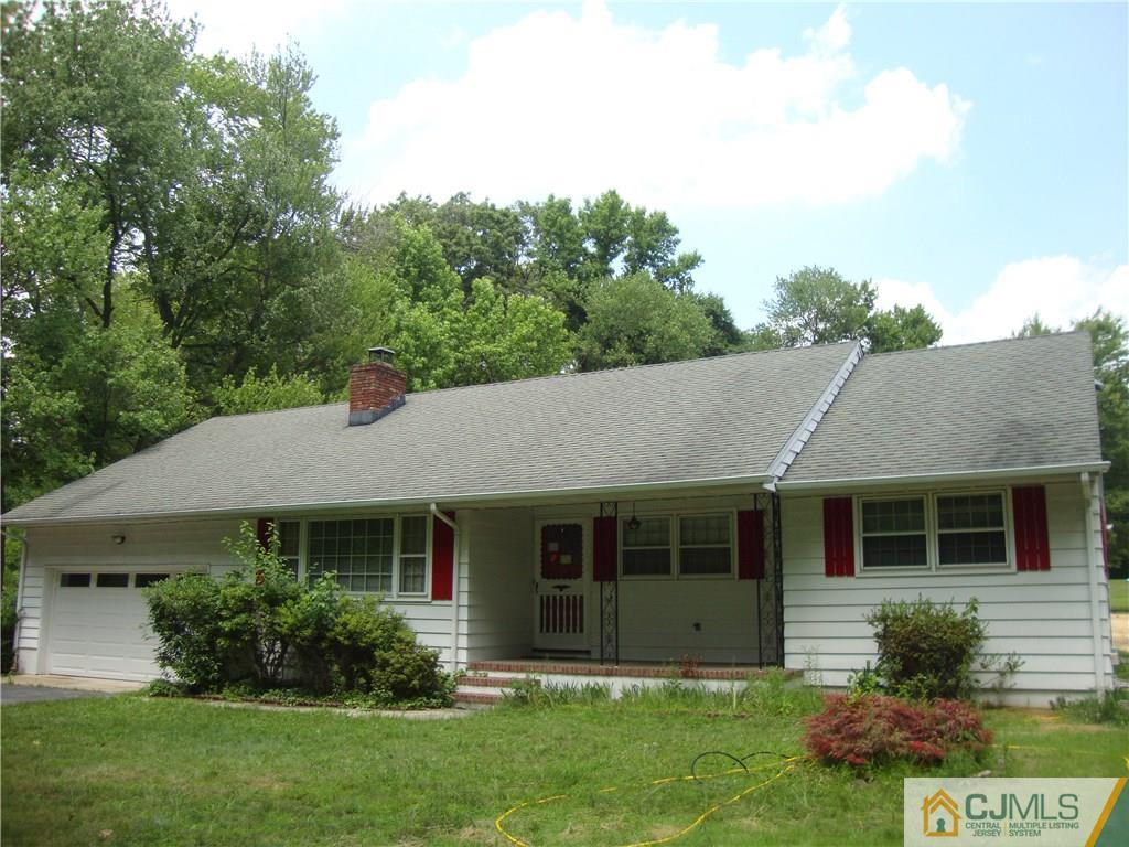 231 Davidson's Mill Road North Brunswick, NJ 08902 - Photo 1 of 17 a view of a house with garden and yard