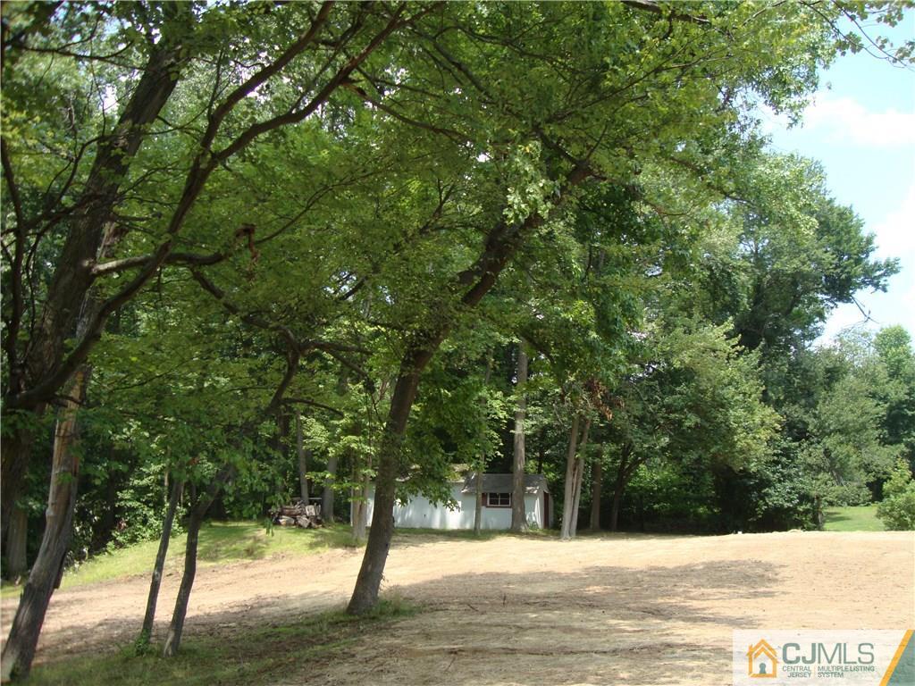 231 Davidson's Mill Road North Brunswick, NJ 08902 - Photo 16 of 17 a view of a house with a yard