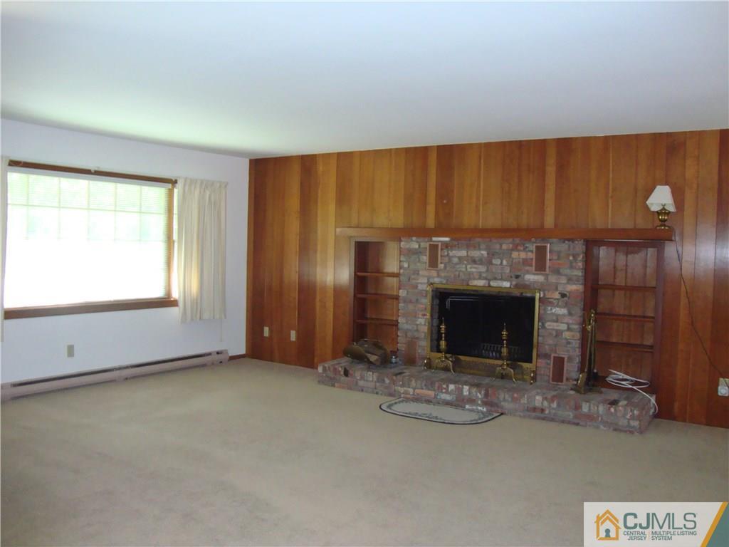231 Davidson's Mill Road North Brunswick, NJ 08902 - Photo 6 of 17 an empty room with windows