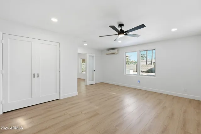 a view of a patio with a table chairs and a patio