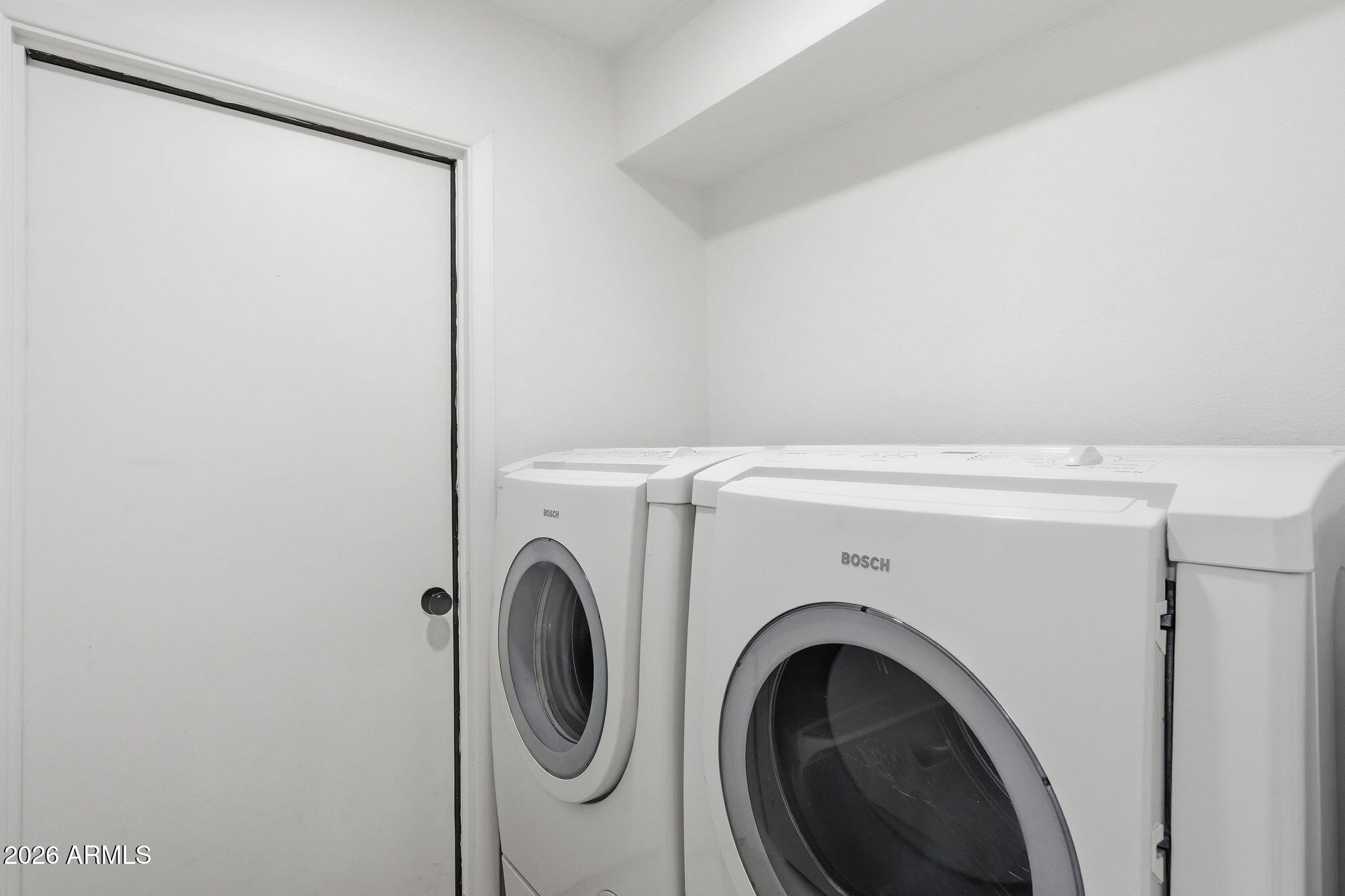6615 East Phelps Road Scottsdale, AZ 85254 - Photo 38 of 53 a utility room with dryer and washer