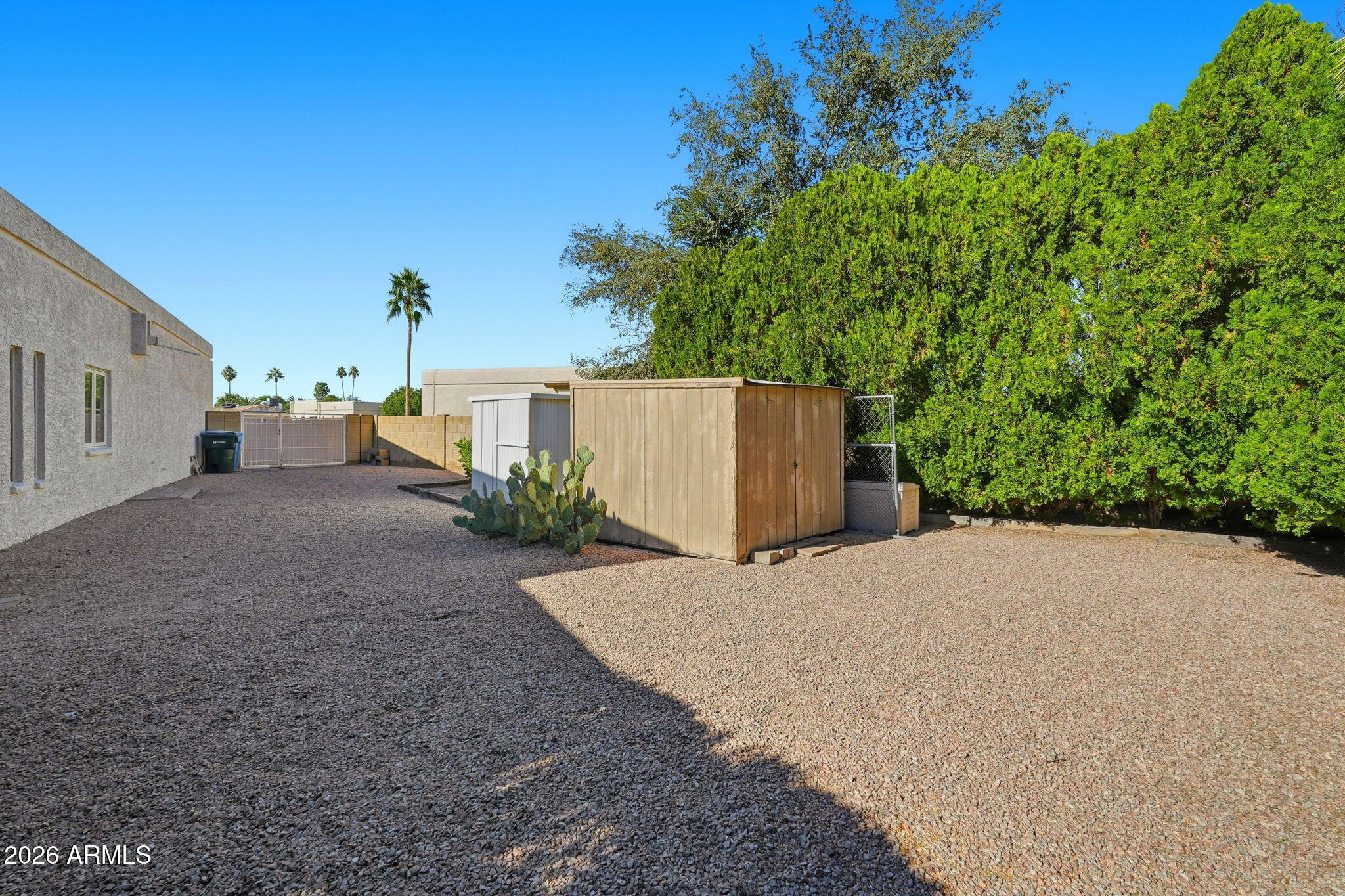 6615 East Phelps Road Scottsdale, AZ 85254 - Photo 48 of 53 a view of a house with a backyard