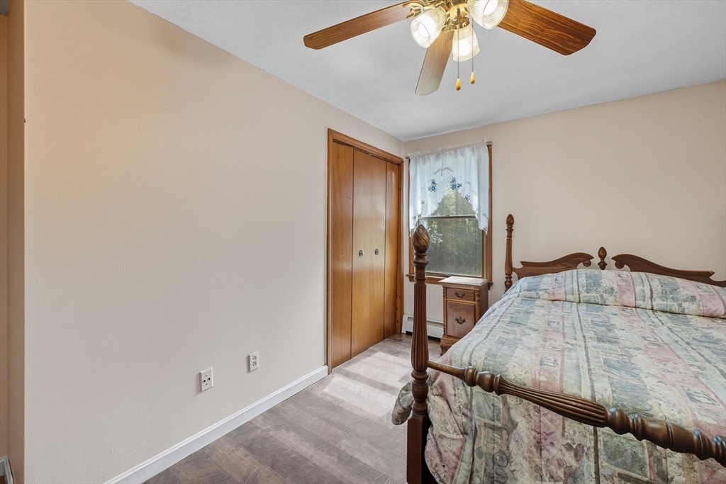 45 Red Gate Road Tyngsborough, MA 01879 - Photo 28 of 42 a bedroom with a bed and a dresser
