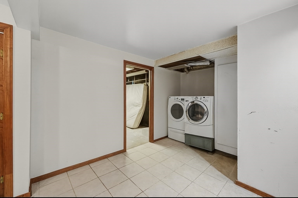 45 Red Gate Road Tyngsborough, MA 01879 - Photo 31 of 42 a utility room with dryer and washer