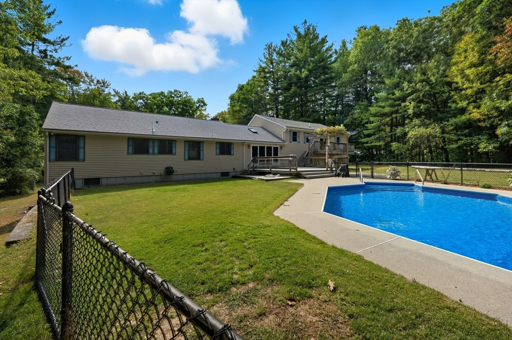 45 Red Gate Road Tyngsborough, MA 01879 - Photo 4 of 42 a view of an house with swimming pool and yard