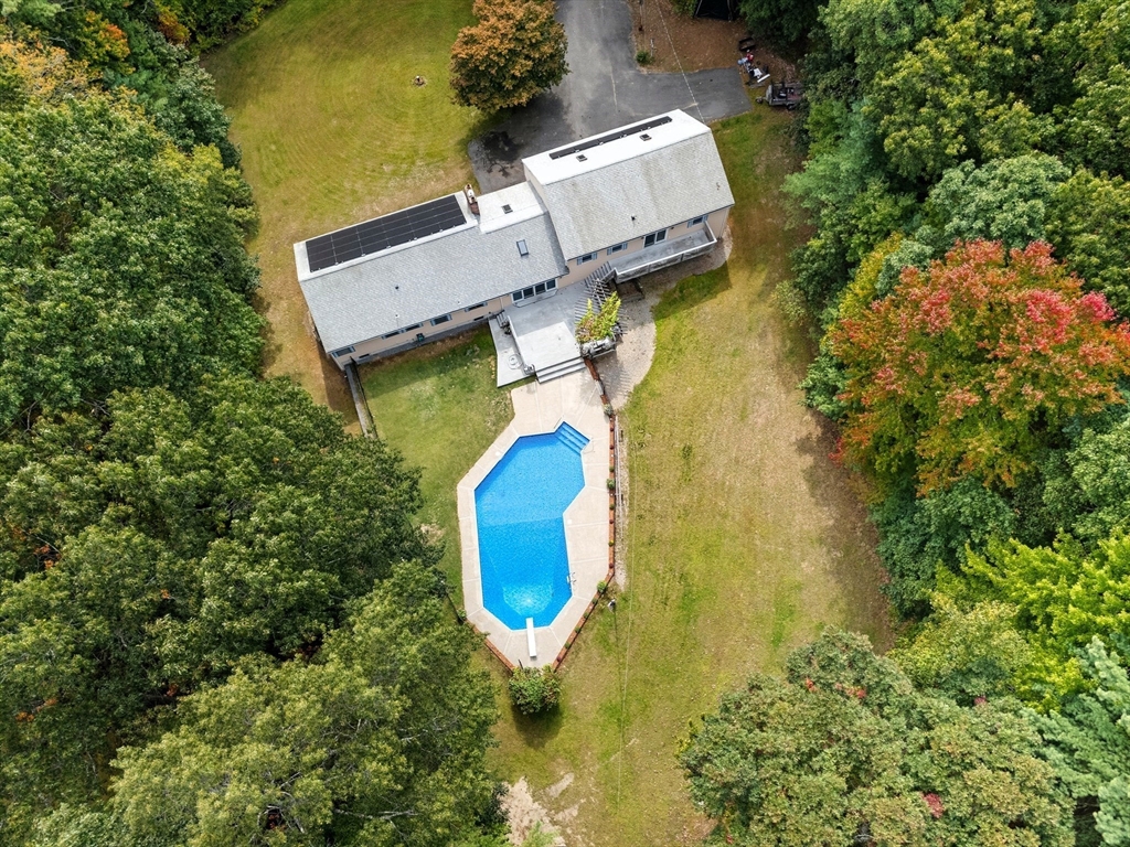 45 Red Gate Road Tyngsborough, MA 01879 - Photo 7 of 42 an aerial view of a house with swimming pool and large trees